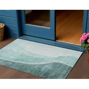 Photo of Teal Blue Aqua And Mint Green Abstract Washable Indoor Outdoor Area Rug