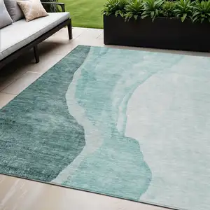 Photo of Teal Blue Aqua And Mint Green Abstract Washable Indoor Outdoor Area Rug