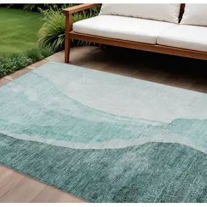 Photo of Teal Blue Aqua And Mint Green Abstract Washable Indoor Outdoor Area Rug