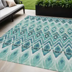 Photo of Teal Blue Aqua And Mint Green Southwestern Washable Indoor Outdoor Area Rug