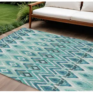 Photo of Teal Blue Aqua And Mint Green Southwestern Washable Indoor Outdoor Area Rug