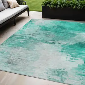 Photo of Teal Blue Aqua And Silver Abstract Washable Indoor Outdoor Area Rug