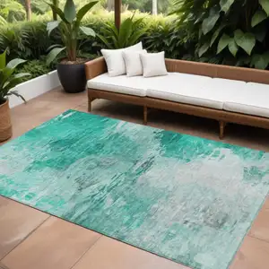 Photo of Teal Blue Aqua And Silver Abstract Washable Indoor Outdoor Area Rug