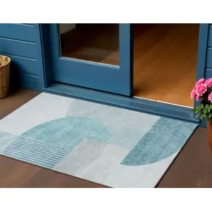 Photo of Teal Blue Blue And Silver Geometric Washable Indoor Outdoor Area Rug