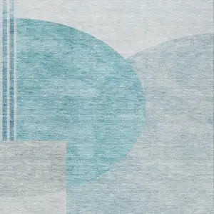 Photo of Teal Blue Blue And Silver Geometric Washable Indoor Outdoor Area Rug