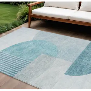 Photo of Teal Blue Blue And Silver Geometric Washable Indoor Outdoor Area Rug