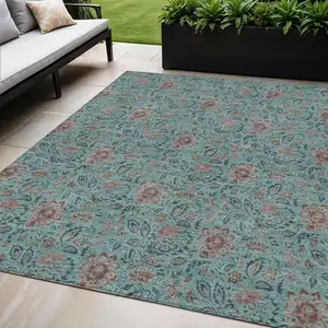 Photo of Teal Blue Brown And Taupe Floral Washable Indoor Outdoor Area Rug