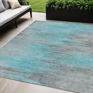 Photo of Teal Blue Charcoal And Gray Abstract Washable Indoor Outdoor Area Rug