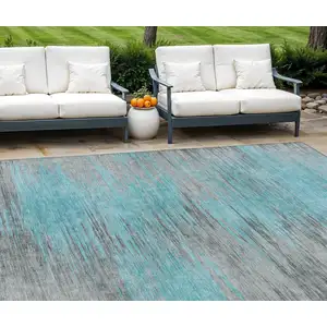 Photo of Teal Blue Charcoal And Gray Abstract Washable Indoor Outdoor Area Rug