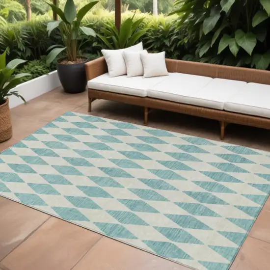 Teal Blue And Ivory Geometric Washable Indoor Outdoor Area Rug Photo 1