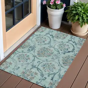 Photo of Teal Blue Gray And Aqua Floral Washable Indoor Outdoor Area Rug