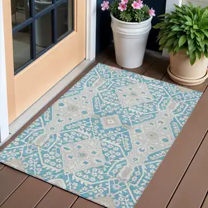 Photo of Teal Blue Gray And Beige Floral Washable Indoor Outdoor Area Rug