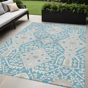 Photo of Teal Blue Gray And Beige Floral Washable Indoor Outdoor Area Rug