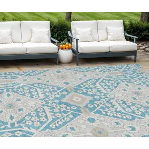 Photo of Teal Blue Gray And Beige Floral Washable Indoor Outdoor Area Rug