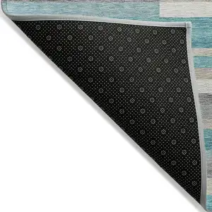 Photo of Teal Blue Gray And Beige Striped Washable Indoor Outdoor Area Rug