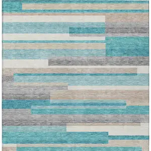 Photo of Teal Blue Gray And Beige Striped Washable Indoor Outdoor Area Rug