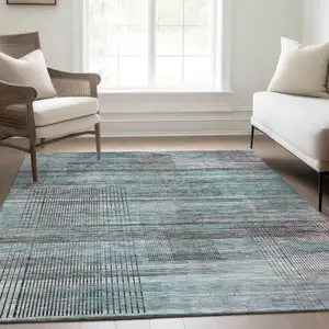 Photo of Teal Blue Gray And Charcoal Striped Washable Indoor Outdoor Area Rug