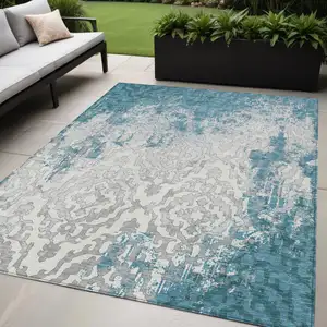 Photo of Teal Blue Gray And Ivory Medallion Washable Indoor Outdoor Area Rug