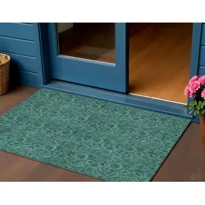 Photo of Teal Blue Green And Charcoal Floral Washable Indoor Outdoor Area Rug