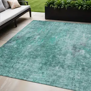 Photo of Teal Blue Green And Gray Abstract Washable Indoor Outdoor Area Rug