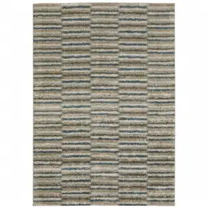 Photo of Teal Blue Grey And Tan Geometric Power Loom Stain Resistant Area Rug