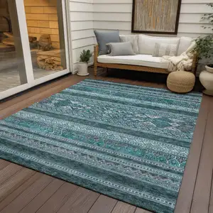 Photo of Teal Blue Ivory And Gray Southwestern Washable Indoor Outdoor Area Rug