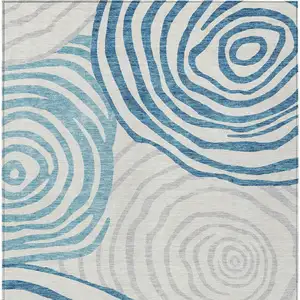 Photo of Teal Blue Ivory And Silver Abstract Washable Indoor Outdoor Area Rug