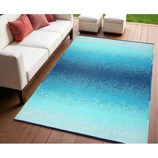 Teal Blue Machine Braided Distressed Area Rug With UV Protection Photo 1