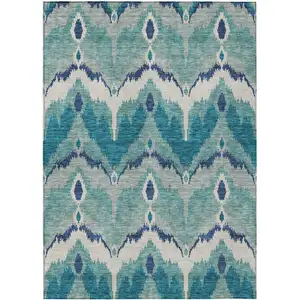 Photo of Teal Blue Navy Blue And Ivory Ikat Washable Indoor Outdoor Area Rug