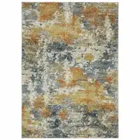 Photo of Teal Blue Orange Gold Grey Tan Brown And Beige Abstract Printed Stain Resistant Non Skid Area Rug