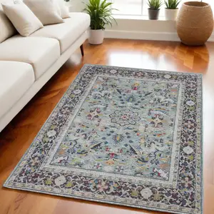 Photo of Teal Blue Orange and Black Floral Distressed Non Skid Area Rug