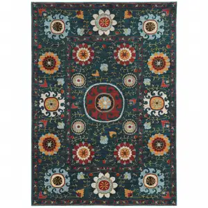 Photo of Teal Blue Rust Gold And Ivory Floral Power Loom Stain Resistant Area Rug