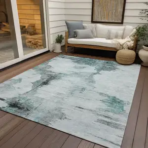 Photo of Teal Blue Silver And Gray Abstract Washable Indoor Outdoor Area Rug