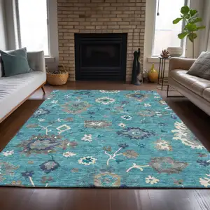 Photo of Teal Blue Silver And Gray Floral Washable Indoor Outdoor Area Rug