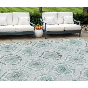 Photo of Teal Blue Silver And Gray Medallion Washable Indoor Outdoor Area Rug