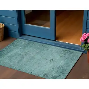 Photo of Teal Blue Turquoise And Charcoal Oriental Washable Indoor Outdoor Area Rug