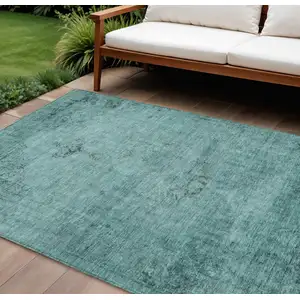 Photo of Teal Blue Turquoise And Charcoal Oriental Washable Indoor Outdoor Area Rug