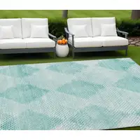 Photo of Teal Geometric Washable Non Skid Indoor Outdoor Area Rug