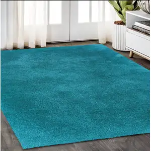 Photo of Teal Shag Hand Tufted Area Rug