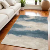 Photo of Teal and Ivory Abstract Non Skid Area Rug