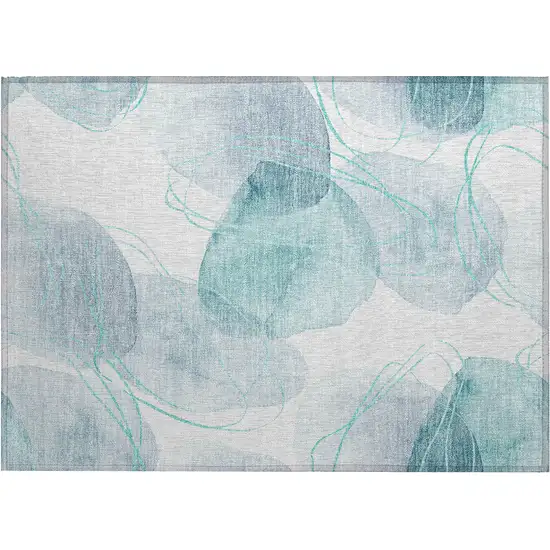 Teal and Ivory Abstract Washable Non Skid Indoor Outdoor Area Rug Photo 1