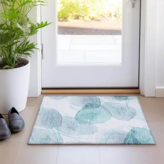 Teal and Ivory Abstract Washable Non Skid Indoor Outdoor Area Rug Photo 8