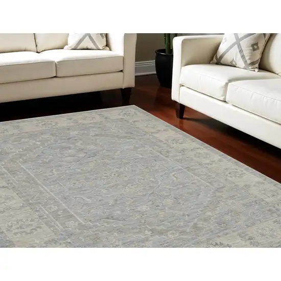 Teal and Ivory Floral Power Loom Area Rug Photo 1