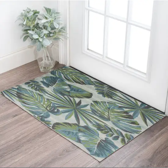 Teal Or Green Tropical Polypropylene Area Rug Photo 1