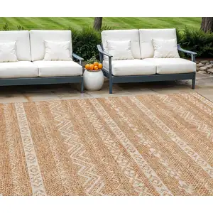 Photo of Terra Cotta And Beige Southwestern Washable Indoor Outdoor Area Rug