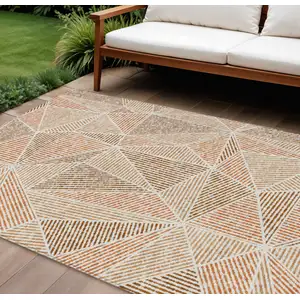 Photo of Terra Cotta Beige And Salmon Geometric Washable Indoor Outdoor Area Rug