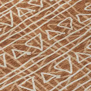 Photo of Terra Cotta Copper And Beige Geometric Washable Indoor Outdoor Area Rug