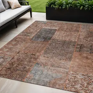 Photo of Terra Cotta Copper And Charcoal Patchwork Washable Indoor Outdoor Area Rug