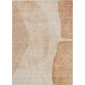 Photo of Terra Cotta Orange And Copper Abstract Washable Indoor Outdoor Area Rug