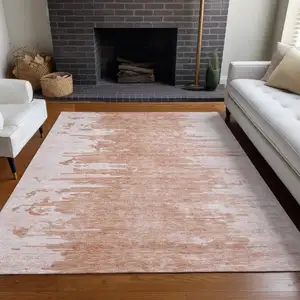 Photo of Terra Cotta Salmon And Copper Abstract Washable Indoor Outdoor Area Rug